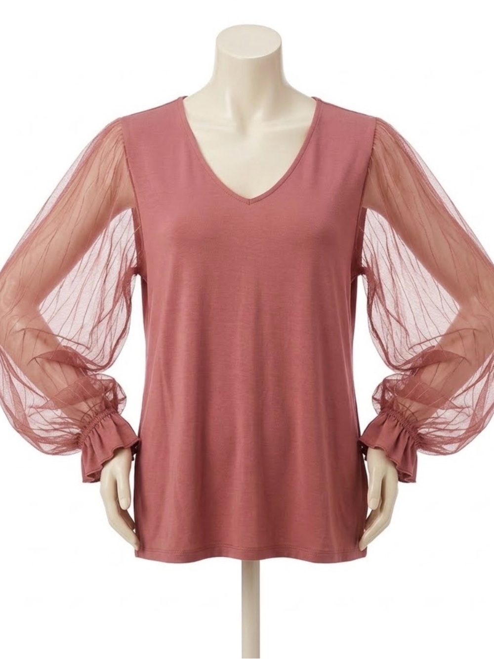Rose colored shirt with beautiful sleeves to show off this season.